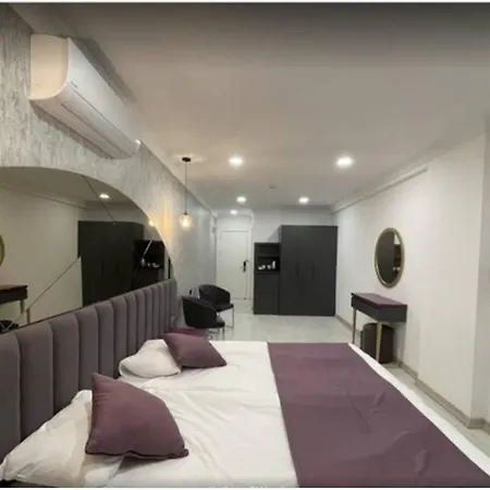Hotel Karikatuer Bi