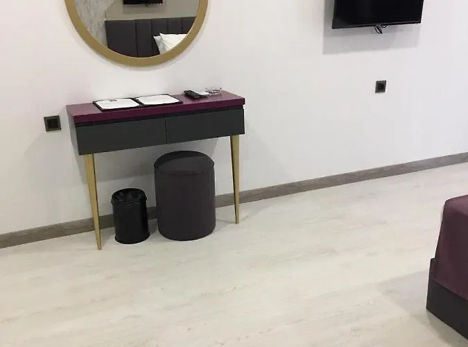 Karikatuer Bi Аланія